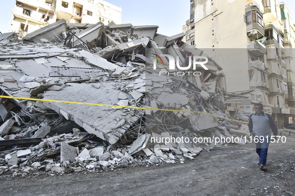 A view of the destruction after the Israeli army targets Bank Kared Al Hassan with a series of airstrikes on the suburb of Dahieh, as debris...