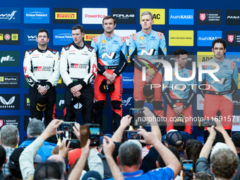 Driver Elfyn Evans and co-driver Scott Martin, driver Ott Tanak and co-driver Martin Jarveoja, and driver Thierry Neuville and co-driver Mar...