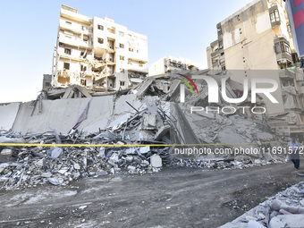 A view of the destruction after the Israeli army targets Bank Kared Al Hassan with a series of airstrikes on the suburb of Dahieh, as debris...