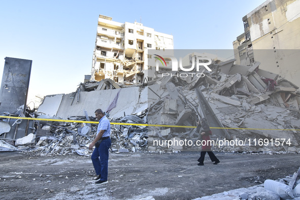 A view of the destruction after the Israeli army targets Bank Kared Al Hassan with a series of airstrikes on the suburb of Dahieh, as debris...