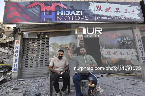 A view of the destruction after the Israeli army targets Bank Kared Al Hassan with a series of airstrikes on the suburb of Dahieh, as debris...