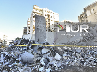 A view of the destruction after the Israeli army targets Bank Kared Al Hassan with a series of airstrikes on the suburb of Dahieh, as debris...