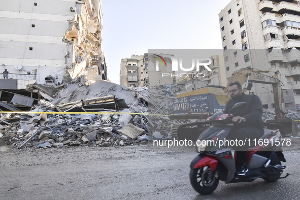 A view of the destruction after the Israeli army targets Bank Kared Al Hassan with a series of airstrikes on the suburb of Dahieh, as debris...