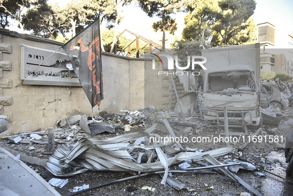 A view of the destruction after the Israeli army targets Bank Kared Al Hassan with a series of airstrikes on the suburb of Dahieh, as debris...