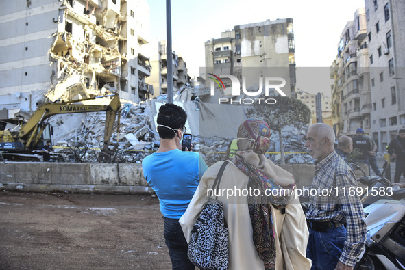 A view of the destruction after the Israeli army targets Bank Kared Al Hassan with a series of airstrikes on the suburb of Dahieh, as debris...