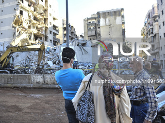 A view of the destruction after the Israeli army targets Bank Kared Al Hassan with a series of airstrikes on the suburb of Dahieh, as debris...