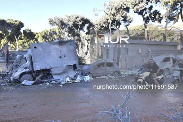 A view of the destruction after the Israeli army targets Bank Kared Al Hassan with a series of airstrikes on the suburb of Dahieh, as debris...