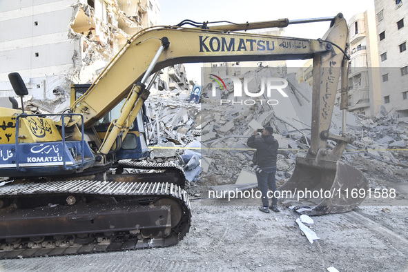 A view of the destruction after the Israeli army targets Bank Kared Al Hassan with a series of airstrikes on the suburb of Dahieh, as debris...