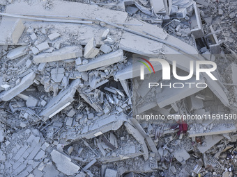 A view of the destruction after the Israeli army targets Bank Kared Al Hassan with a series of airstrikes on the suburb of Dahieh, as debris...