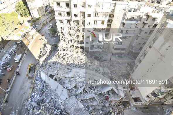 A view of the destruction after the Israeli army targets Bank Kared Al Hassan with a series of airstrikes on the suburb of Dahieh, as debris...