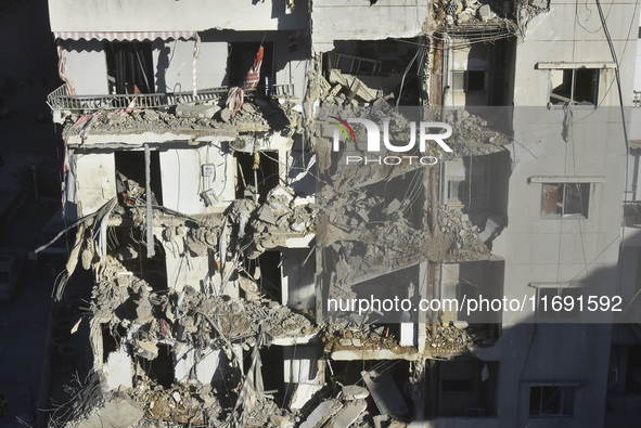 A view of the destruction after the Israeli army targets Bank Kared Al Hassan with a series of airstrikes on the suburb of Dahieh, as debris...