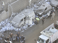 A view of the destruction after the Israeli army targets Bank Kared Al Hassan with a series of airstrikes on the suburb of Dahieh, as debris...