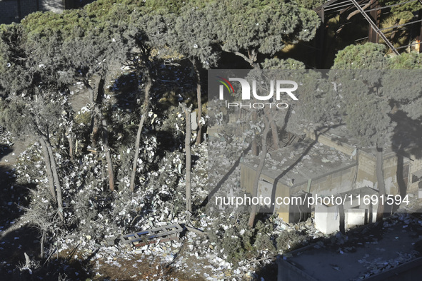 A view of the destruction after the Israeli army targets Bank Kared Al Hassan with a series of airstrikes on the suburb of Dahieh, as debris...