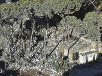 A view of the destruction after the Israeli army targets Bank Kared Al Hassan with a series of airstrikes on the suburb of Dahieh, as debris...