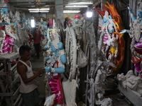 An artist paints an idol of the Hindu goddess Kali inside a workshop in Kolkata, India, on October 21, 2024. Diwali comes from the Sanskrit...