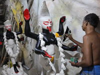 An artist paints an idol of the Hindu goddess Kali inside a workshop in Kolkata, India, on October 21, 2024. Diwali comes from the Sanskrit...