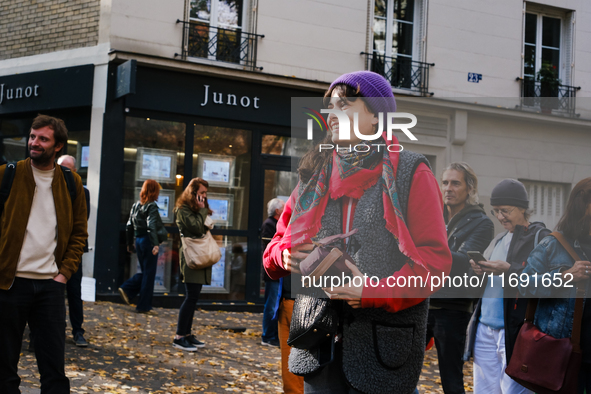 A petanque champion plays in the street after the expulsion of CLAP Montmartre, which has been based on rue Junot in Montmartre for fifty ye...