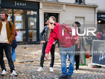 Members of the Lepic Abbesses Petanque Club (CLAP Montmartre) protest against the closure of their pitch by playing on the cobblestones of t...