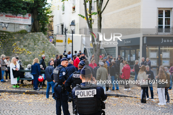 Police prevent members of the Lepic Abbesses Petanque Club from returning to the field from which they were expelled in the early hours of t...