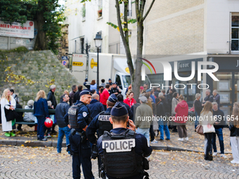 Police prevent members of the Lepic Abbesses Petanque Club from returning to the field from which they were expelled in the early hours of t...