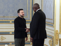 US Secretary of Defense Lloyd Austin and President of Ukraine Volodymyr Zelenskyy shake hands during their meeting in Kyiv, Ukraine, on Octo...