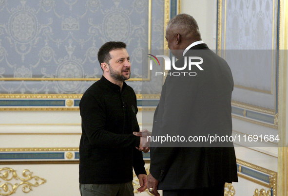 US Secretary of Defense Lloyd Austin and President of Ukraine Volodymyr Zelenskyy shake hands during their meeting in Kyiv, Ukraine, on Octo...