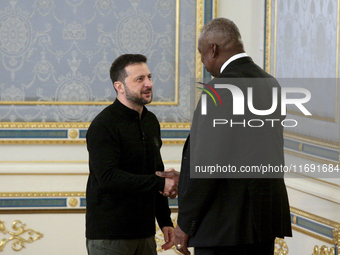 US Secretary of Defense Lloyd Austin and President of Ukraine Volodymyr Zelenskyy shake hands during their meeting in Kyiv, Ukraine, on Octo...