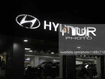 The signage of Hyundai Motor India Ltd. is seen in front of an authorized Hyundai showroom in Mumbai, India, on October 21, 2024. The listin...