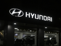 The signage of Hyundai Motor India Ltd. is seen in front of an authorized Hyundai showroom in Mumbai, India, on October 21, 2024. The listin...