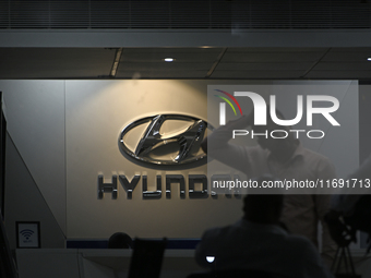 The signage of Hyundai Motor India Ltd. is seen in front of an authorized Hyundai showroom in Mumbai, India, on October 21, 2024. The listin...