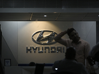 The signage of Hyundai Motor India Ltd. is seen in front of an authorized Hyundai showroom in Mumbai, India, on October 21, 2024. The listin...