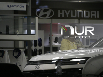 The signage of Hyundai Motor India Ltd. is seen in front of an authorized Hyundai showroom in Mumbai, India, on October 21, 2024. The listin...