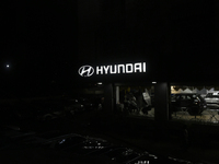 The signage of Hyundai Motor India Ltd. is seen in front of an authorized Hyundai showroom in Mumbai, India, on October 21, 2024. The listin...