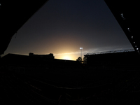 The sun sets behind the City Ground before the Premier League match between Nottingham Forest and Crystal Palace at the City Ground in Notti...