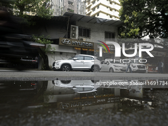 The signage of Hyundai Motor India Ltd. is seen in front of an authorized Hyundai vehicle workshop in Mumbai, India, on October 19, 2024. Th...