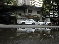 The signage of Hyundai Motor India Ltd. is seen in front of an authorized Hyundai vehicle workshop in Mumbai, India, on October 19, 2024. Th...