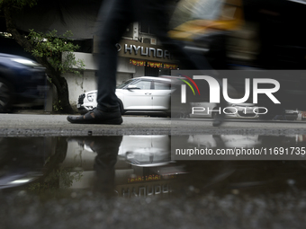 The signage of Hyundai Motor India Ltd. is seen in front of an authorized Hyundai vehicle workshop in Mumbai, India, on October 19, 2024. Th...