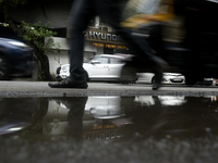 The signage of Hyundai Motor India Ltd. is seen in front of an authorized Hyundai vehicle workshop in Mumbai, India, on October 19, 2024. Th...