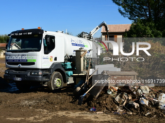 Several volunteers and residents participate in the restoration of the village of Limony in Ardeche, France, on October 21, 2024, after the...