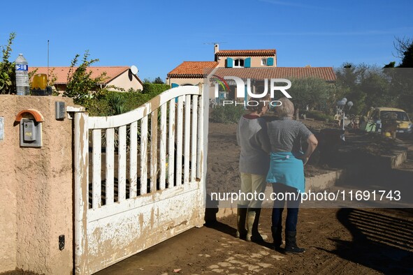 Several volunteers and residents participate in the restoration of the village of Limony in Ardeche, France, on October 21, 2024, after the...