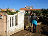 Several volunteers and residents participate in the restoration of the village of Limony in Ardeche, France, on October 21, 2024, after the...