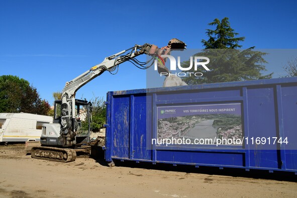 Several volunteers and residents participate in the restoration of the village of Limony in Ardeche, France, on October 21, 2024, after the...