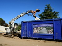 Several volunteers and residents participate in the restoration of the village of Limony in Ardeche, France, on October 21, 2024, after the...