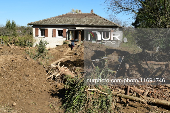 Several volunteers and residents participate in the restoration of the village of Limony in Ardeche, France, on October 21, 2024, after the...