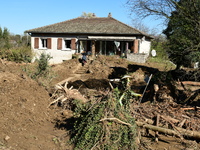 Several volunteers and residents participate in the restoration of the village of Limony in Ardeche, France, on October 21, 2024, after the...