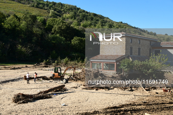 Several volunteers and residents participate in the restoration of the village of Limony in Ardeche, France, on October 21, 2024, after the...