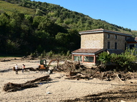 Several volunteers and residents participate in the restoration of the village of Limony in Ardeche, France, on October 21, 2024, after the...