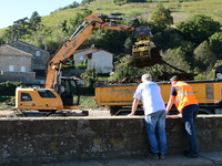 Several volunteers and residents participate in the restoration of the village of Limony in Ardeche, France, on October 21, 2024, after the...