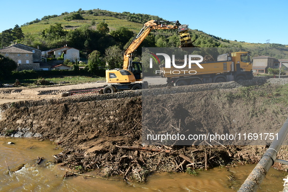 Several volunteers and residents participate in the restoration of the village of Limony in Ardeche, France, on October 21, 2024, after the...