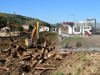 Several volunteers and residents participate in the restoration of the village of Limony in Ardeche, France, on October 21, 2024, after the...